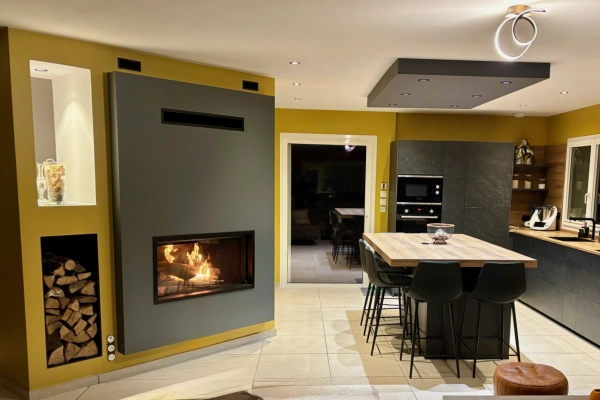 Installation d’une cheminée bois à foyer horizontal à Feuguerolles-Bully