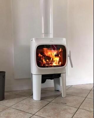 Installation d’un poêle Jotul F105 blanc à Courseulles sur Mer