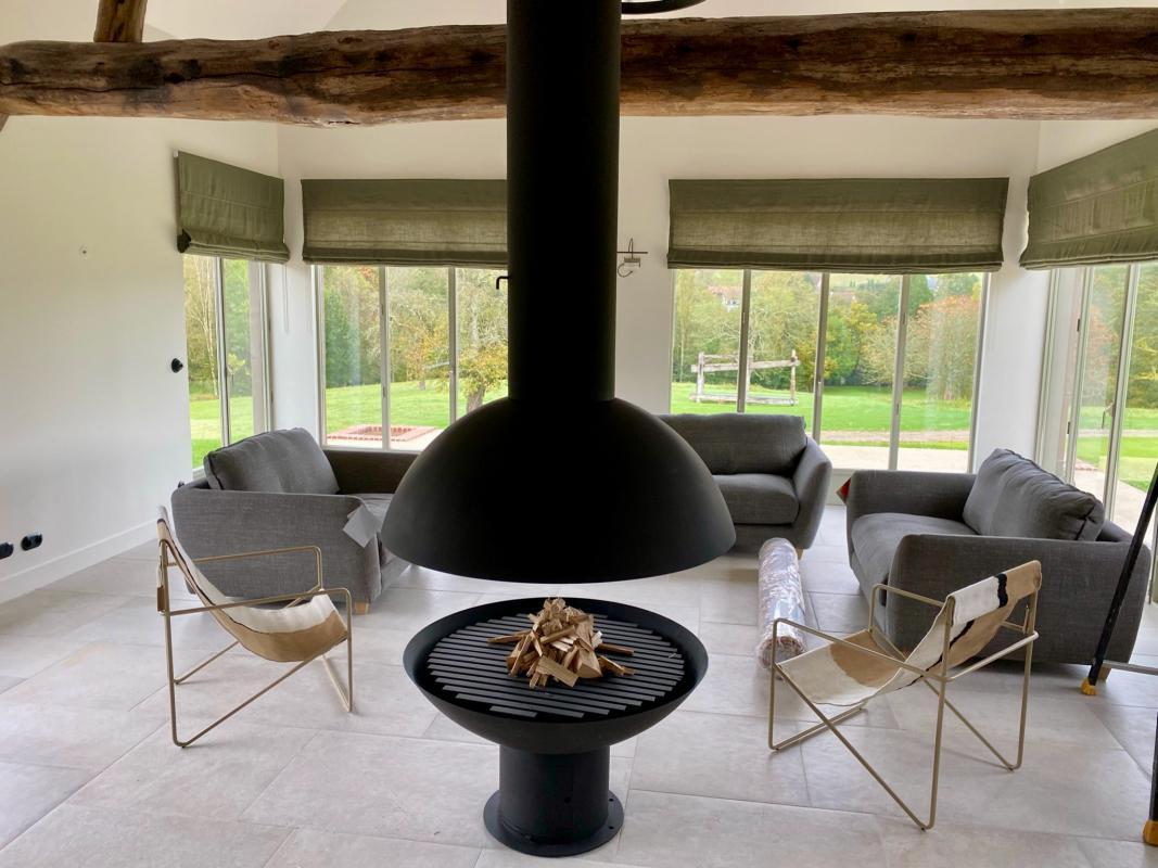 Pose d'une cheminée à bois-bûche Mezzofocus à Surville - Cheminées Benoist