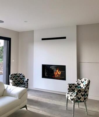 Pose d'une cheminée à bois-bûche Argento 1050H M design à Eterville