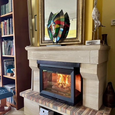 Pose d’un insert bois Jotul dans la côte de nacre.