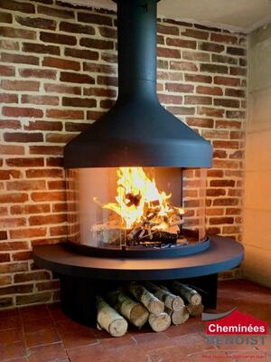 Installation d'une cheminée Optifocus à bois-bûche